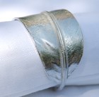 Pair of feather napkin rings